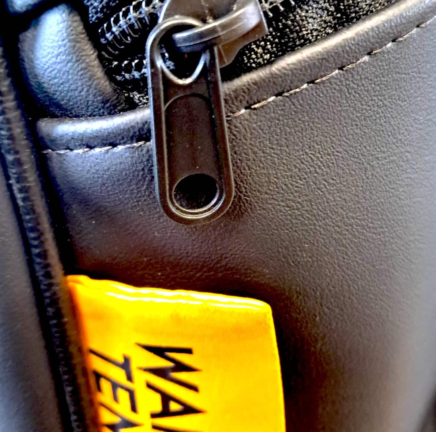 WARDO TENGO. Matte Black EveryThing bag tag zip_exterior view